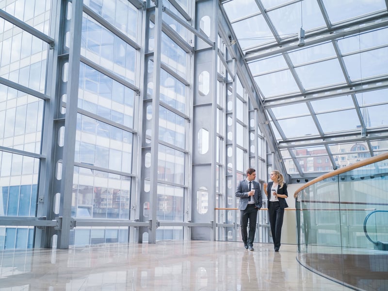 Man and Woman walking on a stairway