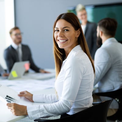 Woman in an office smiling